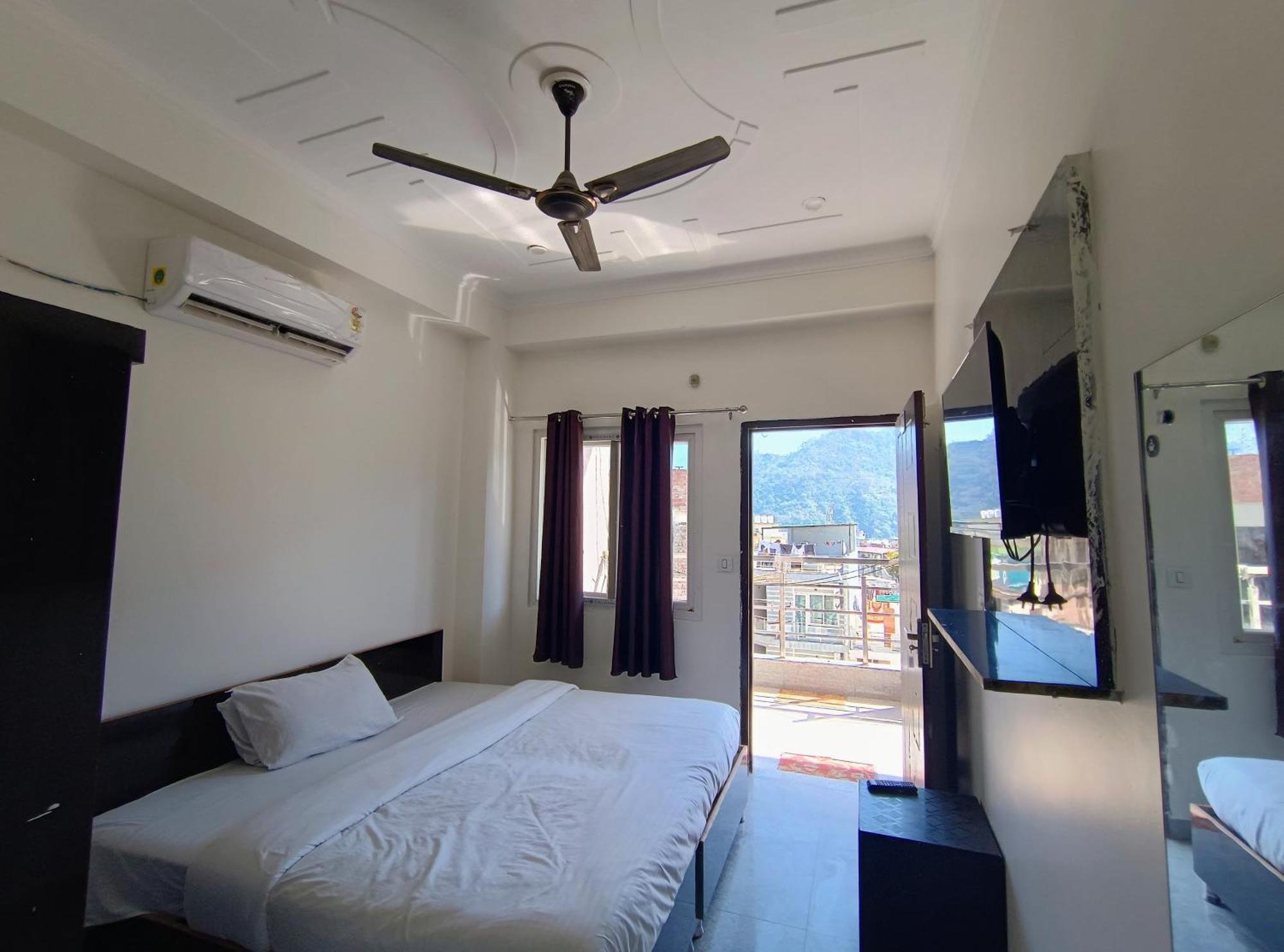 Hotel Aman Rishīkesh Rom bilde